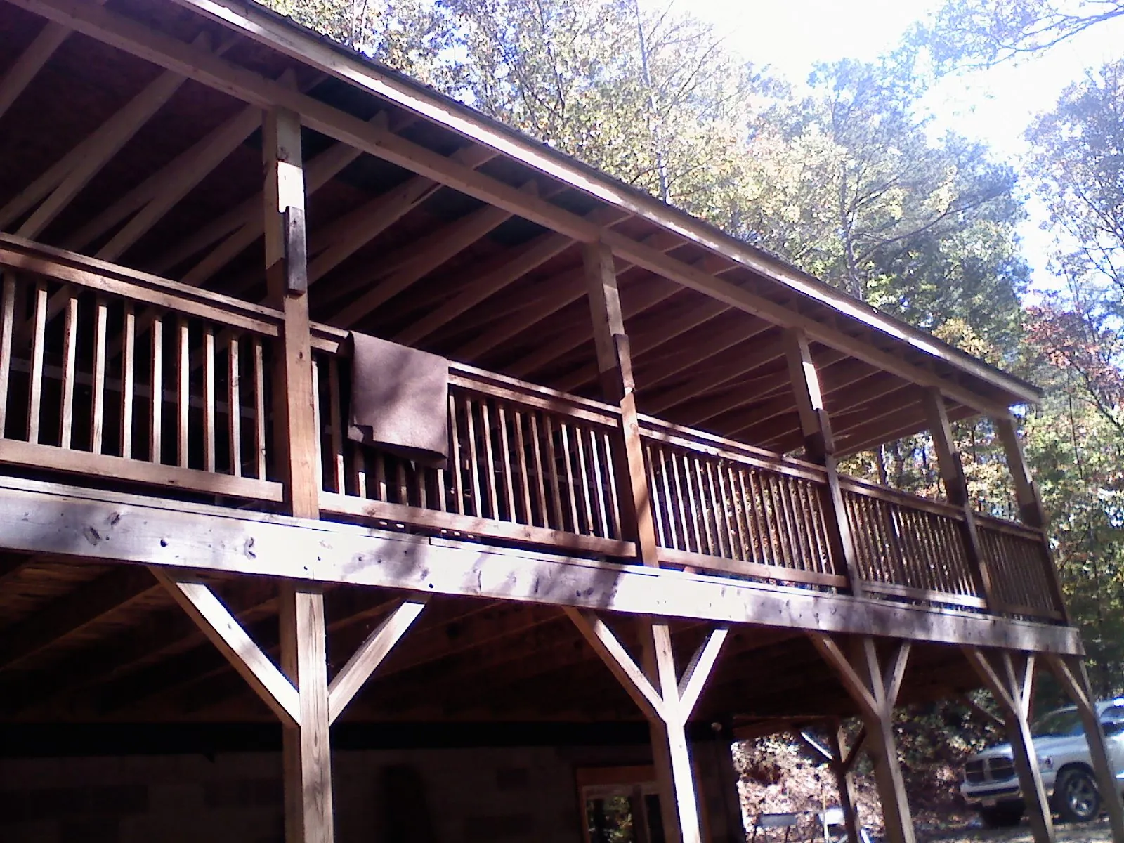 Timber framing under a new elevated porch and deck — Roof Leak Repair in Riceville by Roofing Brothers